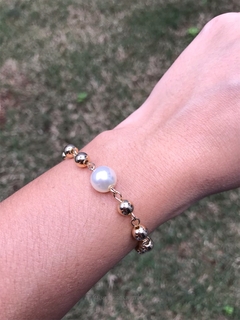 Pulseira de esferas com pérola