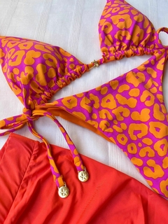 CORTININHA ONÇA LARANJA COM PINK na internet