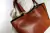 Cartera de cuero vacuno para mujer. Modelo Tote bag. Color Cognac