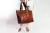 Cartera de cuero vacuno para mujer. Modelo Tote bag. Color cognac
