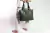 Cartera de cuero vacuno para mujer. Modelo Tote bag. Color Oliva