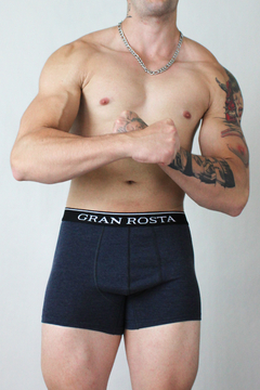Bóxer para hombres fuertes y masculinos, con tela elástica y ajuste ergonómico. Diseño robusto y transpirable para máximo rendimiento y confort.