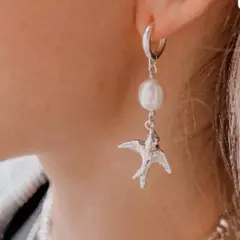 Aros Pajarito con Perla en internet