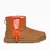 Bota UGG Classic Mini Zipper Tape Logo Caramelo - comprar online
