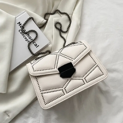 bolso blanco taches en internet