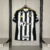 Camisa masculina do Atlético Mineiro 25/26, preta e branca, com detalhes em amarelo e patrocinadores. fut outlet