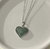 Collar plateado dije corazón con zirconias verdes