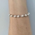 Pulsera bolitas arenadas y lisas