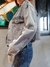 Campera Jean corta gris con tachas negras en internet