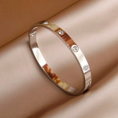 Three gold love bracelets on internet