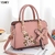 Bolsa para mulheres, inteligentes, elegantes e determinadas, portátil PU, padrão lichia. - comprar online