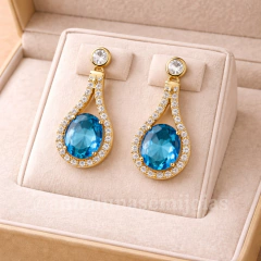 Brinco Pedra Azul Cravejado Banhado a Ouro - comprar online