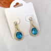 Brinco Pedra Azul Cravejado Banhado a Ouro - comprar online