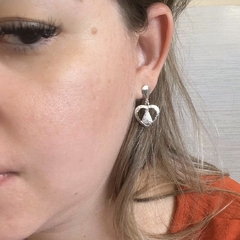 Brinco Coração Vazado com Nossa Senhora Aparecida Banhado a Ouro na internet