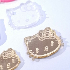 Aros en Argolla fantasia con dije de Hello Kitty traslucido - comprar online