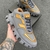 PRADA CLOUDBUST THUNDER - CINZA/DOURADO - Rgs Store Oficial