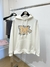 MOLETOM DIOR COM LOGOTIPO CRAVEJADO EM STRASS. na internet
