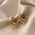 BRINCOS ARGOLA TRIPLA BANHADO A OURO 18K