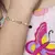 PULSEIRA INFANTIL BORBOLETAS COM PÉROLAS na internet
