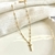 Colar choker crucifixo Ivone - comprar online