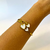 Bracelete coração madrepérola aço dourado na internet