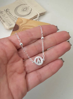 Pulseira nossa senhora com esferas na internet