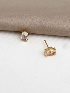 BRINCO PONTO DE LUZ OVAL COM GARRAS BANHO A OURO 18K
