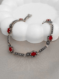 PULSEIRA PRATA DE BALI COM RUBI E MARCASSITAS