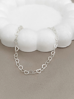 PULSEIRA DE CORAÇÕES VAZADOS PRATA 925