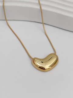 COLAR CURVO ORGÂNICO POLIDO BANHO A OURO 18K na internet