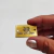 Etiqueta Couro Sintético Metalizado Dourado - Retangular 3x2 cm