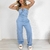 Macacão Jeans Feminino Zíper Tomara Que Caia Curto Botão