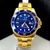 1ª Linha Submariner - dourado e azul - Pulseira de aço