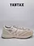 Zapatillas Adidas Bad Bunny Adizero SL 72 en color blanco off white, con detalles en azul y diseño moderno.