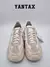 Zapatillas Adidas Bad Bunny Adizero SL 72 en color blanco con detalles en gris.
