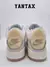 Zapatillas Jordan 3 Retro Craft Ivory, vista trasera mostrando detalles en la suela y el logo de Nike.