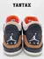 Zapatillas Jordan 3 Retro Desert Elephant desde atrás, mostrando el logotipo de Air y detalles en color marrón.