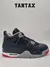 Zapatillas Jordan 4 Retro Bred Reimagined 2024 en color gris con detalles rojos y grises.