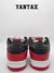 Zapatillas Nike SB Dunk Low Pro J-Pack Chicago en color rojo y negro, vistas desde atrás.
