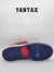 Suela de las zapatillas Nike SB Dunk Low Pro Reverse Papa Bear, mostrando detalles en color azul y rojo.