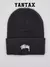 Gorro beanie negro de Nike x Stussy con logo bordado en blanco
