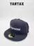 Gorra New Era 59Fifty con logo de Supreme en color azul marino.