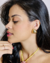 BRINCO TRIANGULO LISO LISO BANHADO A OURO 18K
