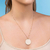Imagem do Medalha redonda lisa para personalizar folheada a ouro 18k - tam.único 542773
