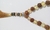 Japamala 1/4 De Rudraksha Com Cristal Bege na internet