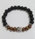 Pulseira Pedra Ônix Fosca 8mm Com Cristal Marrom - comprar online