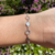 Pulseira Círculos e Placa - comprar online