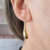 Brinco gota banho ouro 18k