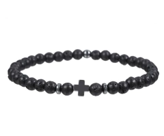 Pulsera bolitas negras con dije de cruz