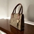 Bolso de Piel Artesanal Duo Marron en internet